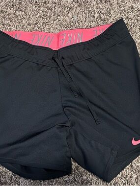 Nike Women’s Black Athletic Shorts with Pink Accents